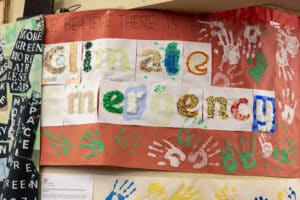 Children artwork reading "Climate emergency"