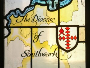 A stained glass panel with Diocese of Southwark engraved above a map of London.